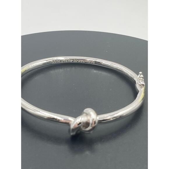 Kate Spade Sailor's Knot Love Knot Polished Silver Tone Hinged Bangle Bracelet - Picture 2 of 9